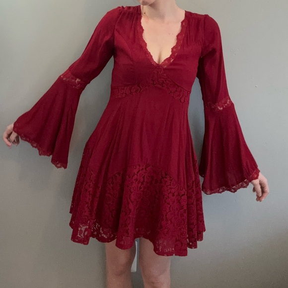 Francesca's Collections Dresses & Skirts - Francesca’s red bell sleeve mini dress with lace detail.